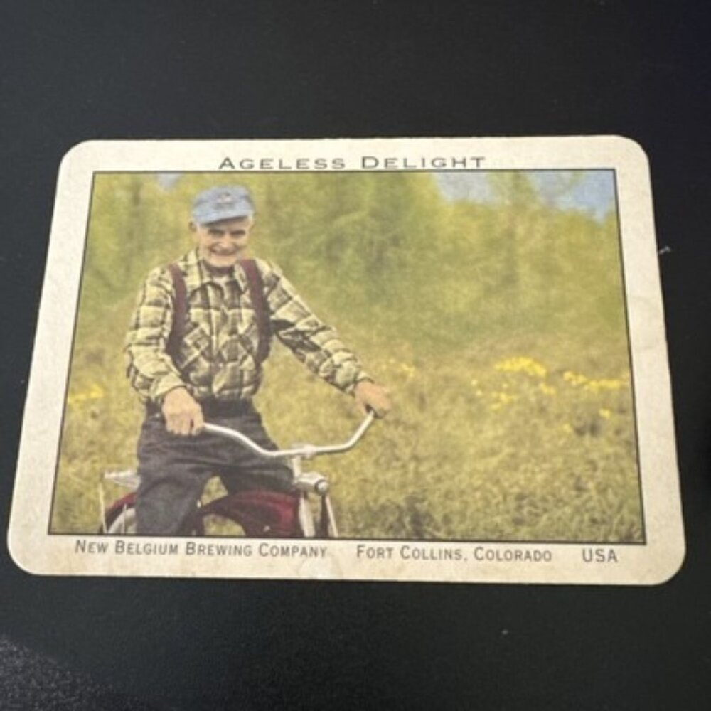 New Belgium FAT TIRE AMBER ALE Ad Postcard Older Man on Bicycle UNP Thicker Card